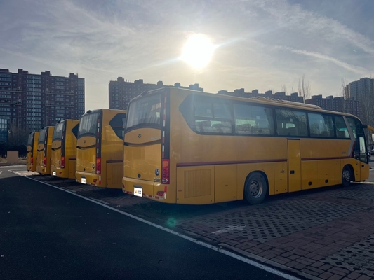 Un autobus King Long giallo usato, con motore Yuchai da 63 posti e cambio manuale