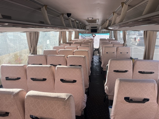 Un autobus King Long giallo usato, con motore Yuchai da 63 posti e cambio manuale